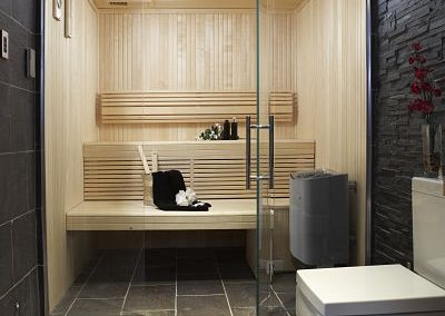 Sauna with low lighting and wooden seating